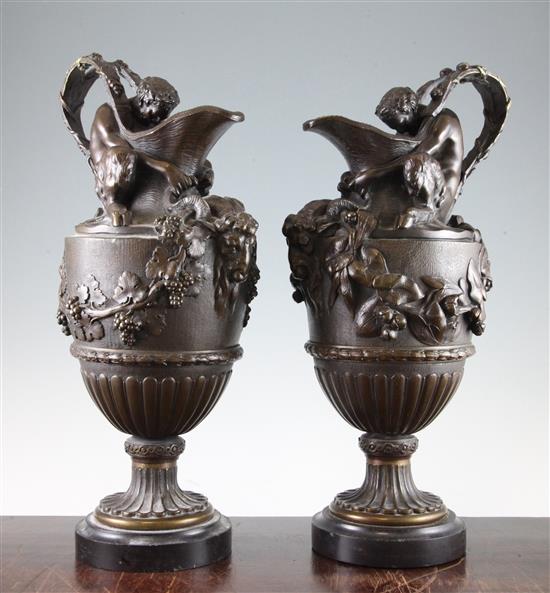 A pair of 20th century bronze urns, 16.5in.